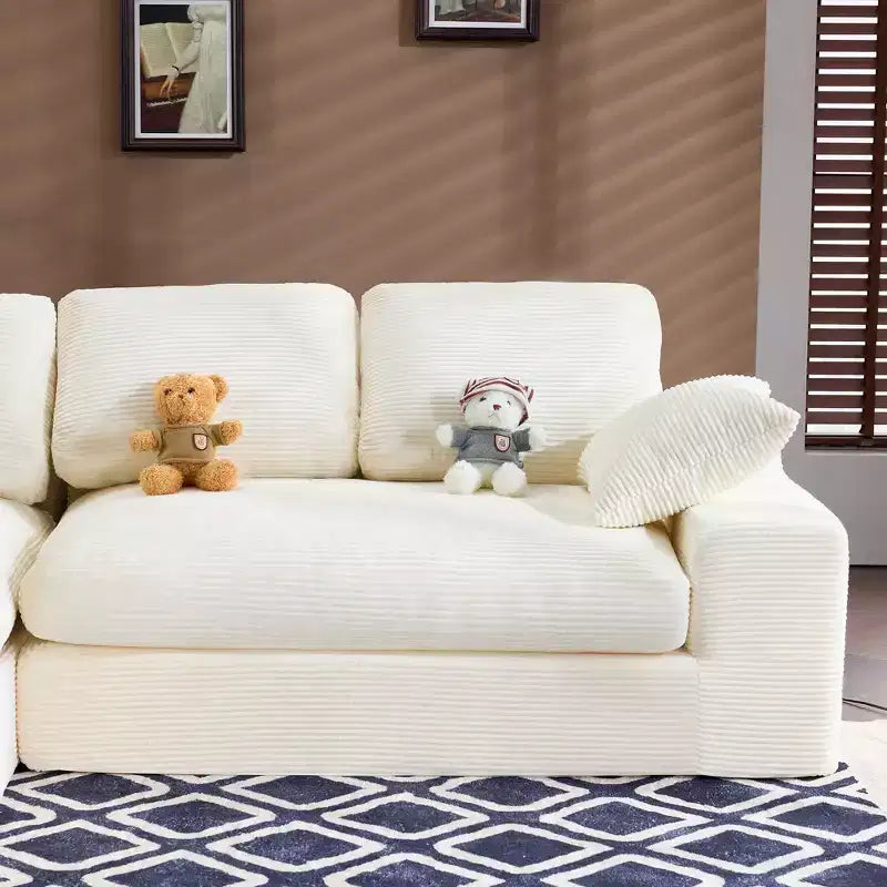 Sofá cómodo de pana blanca con 5 cojines – Esencial para una sala de estar acogedora