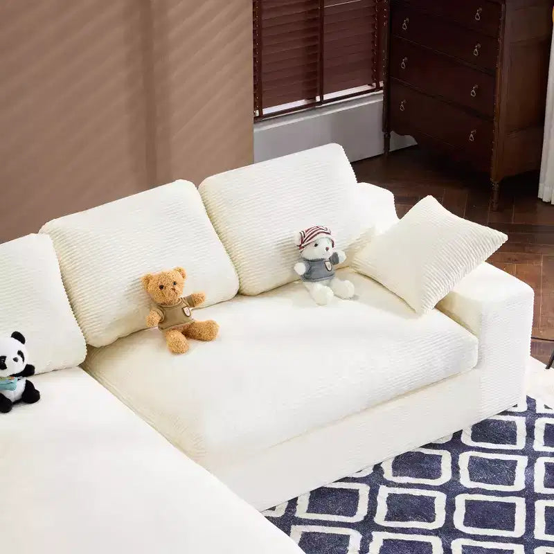 Sofá cómodo de pana blanca con 5 cojines – Esencial para una sala de estar acogedora